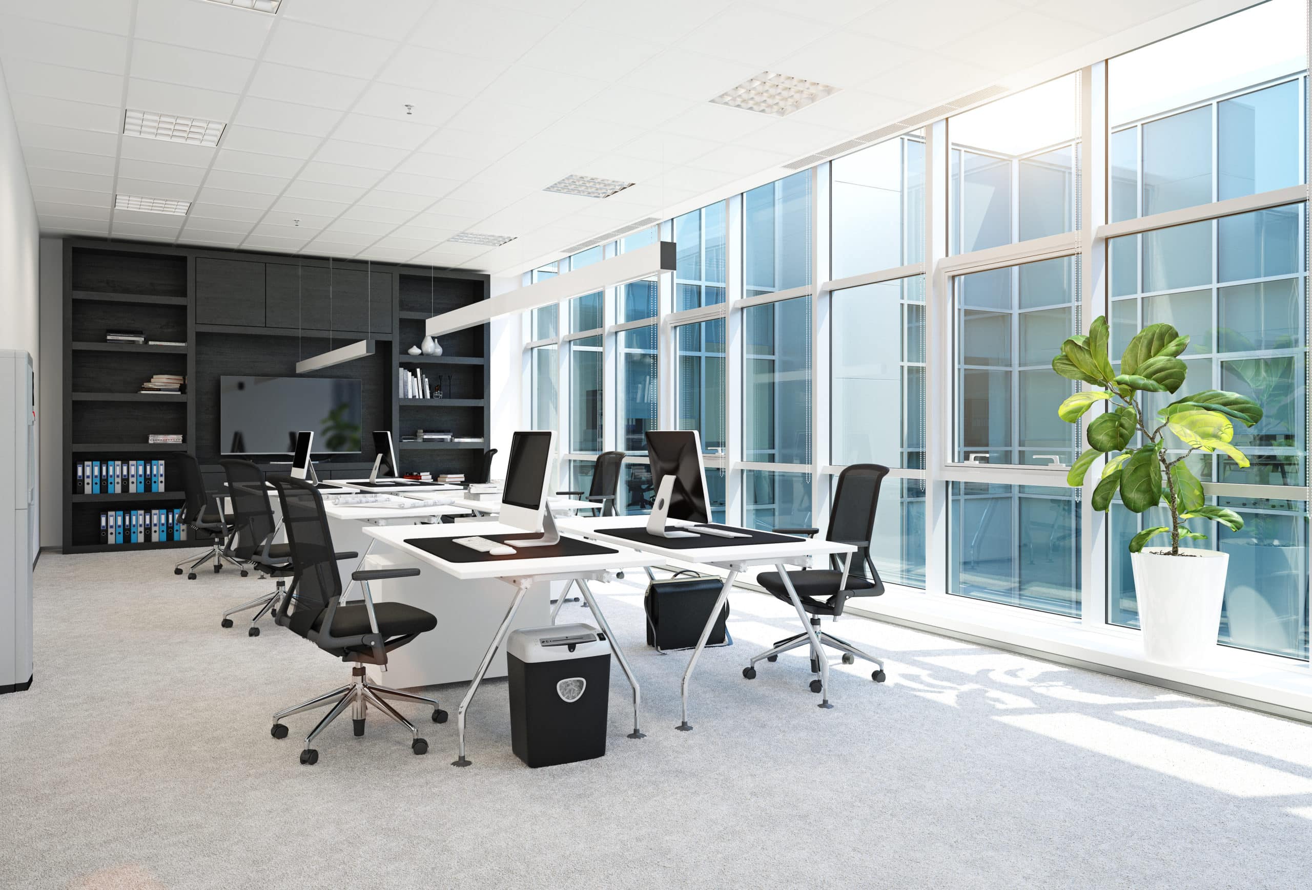 The photo shows a clean boardroom office.